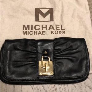 Micheal Kors black leather clutch